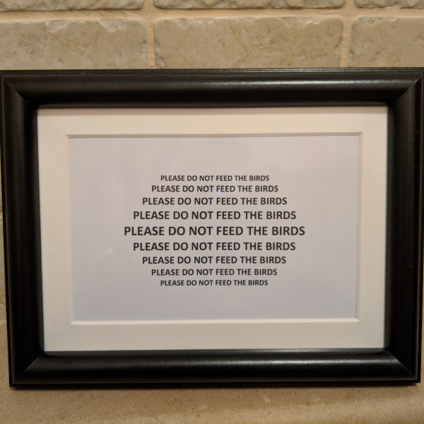 don't feed the birds sign ladies room dubrovnik city walls croatia